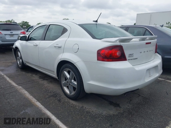 2013 Dodge Avenger SXT with VIN 1C3CDZCG9DN772959, listed as a IAAI auction lot 41971187 with 121,530 mi miles and . Bid and sale history available at carsss.com. Image 3.