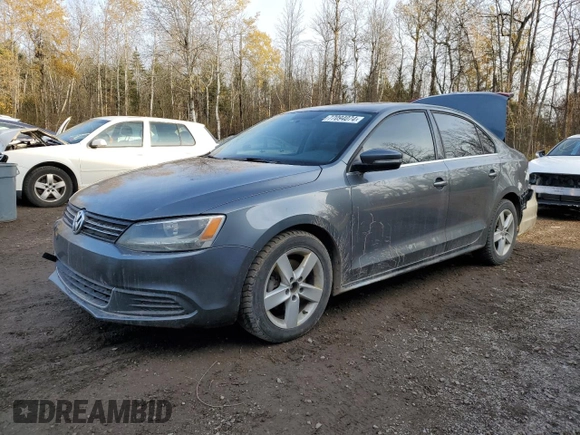 2013 Volkswagen Jetta Comfortline с VIN 3VWDL7AJ4DM408378, выставлен на аукционе Copart как лот 77094074 с пробегом 169 129 миль миль и Списание • Salvage title. История ставок и продаж доступна на DreamBid. Изображение 1.