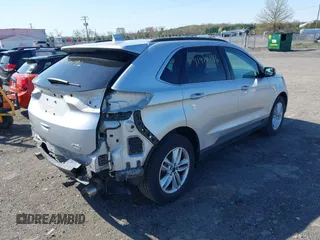 2015 Ford Edge SEL with VIN 2FMTK3J95FBC30089, listed as a IAAI auction lot 41920196 with 69,880 mi miles. Bid and sale history available at carsss.com. Image 4.