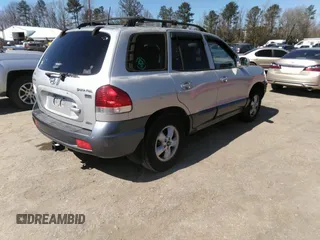 2005 Hyundai Santa Fe GLS with VIN KM8SC73E25U884390, listed as a IAAI auction lot 41824089 with 127,570 mi miles. Bid and sale history available at carsss.com. Image 4.