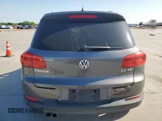 2014 Volkswagen Tiguan SEL z VIN WVGAV3AX6EW030705, wystawiony jako Copart lot #52156805 z przebiegiem 142 377 mil mil oraz Szkoda całkowita • Salvage title. Historia ofert i sprzedaży dostępna na DreamBid. Obrazek 6.