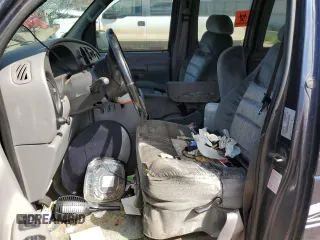 2001 Ford Econoline Cargo with VIN 1FDRE14W41HB55470, listed as a Copart auction lot 64990214 with 176,643 mi miles and Clean Title. Bid and sale history available at DreamBid. Image 7.