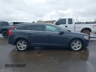 2015 Volvo V60 T5 Drive-E Premier with VIN YV126MEB5F1208042, listed as a IAAI auction lot 41794064 with 118,872 mi miles. Bid and sale history available at carsss.com. Image 13.