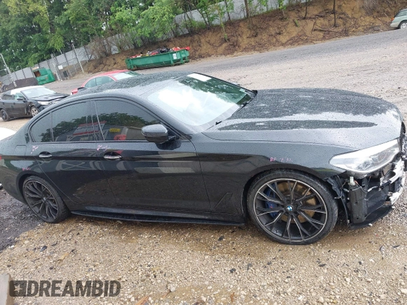 2018 BMW 5 Series M550i xDrive with VIN WBAJB9C5XJB286923, listed as a IAAI auction lot 42527301 with 76,923 mi miles and . Bid and sale history available at DreamBid. Image 13.