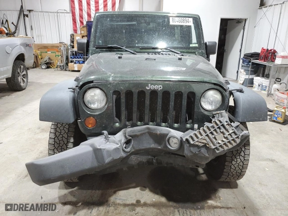 2010 Jeep Wrangler Unlimited Rubicon with VIN 1J4BA6H12AL177942, listed as a Copart auction lot 80460894 with 63,668 mi miles and Salvage Title. Bid and sale history available at carsss.com. Image 5.