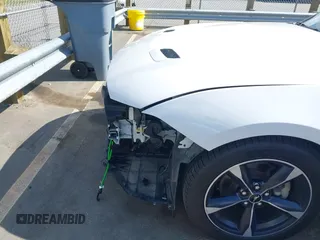 2020 Ford Mustang EcoBoost with VIN 1FA6P8TH4L5190405, listed as a IAAI auction lot 42221673 with 54,854 mi miles and . Bid and sale history available at DreamBid. Image 6.