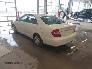 2004 Toyota Camry LE with VIN 4T1BE32K64U339432, listed as a IAAI auction lot 41622306 with 116,442 mi miles. Bid and sale history available at carsss.com. Image 3.