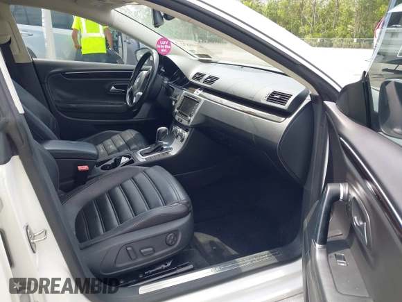2014 Volkswagen CC Executive z VIN WVWRP7AN7EE537318, wystawiony jako IAAI lot #42308532 z przebiegiem 217 059 mil mil oraz . Historia ofert i sprzedaży dostępna na DreamBid. Obrazek 5.