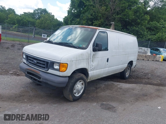 2006 Ford Econoline Cargo with VIN 1FTNE24W06DA77101, listed as a IAAI auction lot 42740817 with 196,854 mi miles and . Bid and sale history available at DreamBid. Image 2.