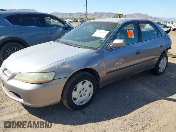 2000 Honda Accord LX z VIN 1HGCG1645YA021815, wystawiony jako IAAI lot #42438876 z przebiegiem 219 687 mil mil oraz . Historia ofert i sprzedaży dostępna na DreamBid. Obrazek 2.