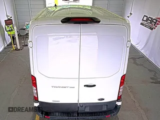 2020 Ford Transit Cargo with VIN 1FTBR1CG6LKB75357, listed as a IAAI auction lot 42243287 with 100,958 mi miles and . Bid and sale history available at DreamBid. Image 9.