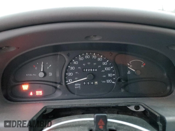 1999 Ford Escort LX z VIN 1FAFP10P6XW211371, wystawiony jako Copart lot #82523444 z przebiegiem 122 534 mil mil oraz Szkody całkowita. Historia ofert i sprzedaży dostępna na DreamBid. Obrazek 9.