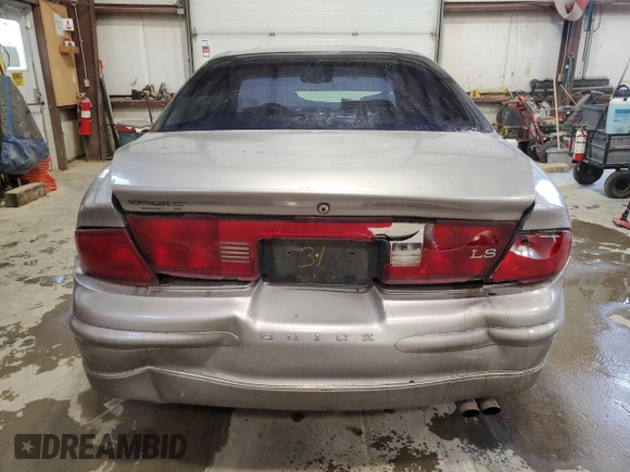 1999 Buick Regal LS with VIN 2G4WB52K3X1470162, listed as a Copart auction lot 79957944 with 153,249 mi miles and Salvage Title. Bid and sale history available at carsss.com. Image 6.