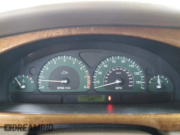 2003 Jaguar S-Type z VIN SAJEA01U53HM58399, wystawiony jako Copart lot #62006044 z przebiegiem 86 841 mil mil oraz Szkoda całkowita • Salvage title. Historia ofert i sprzedaży dostępna na DreamBid. Obrazek 9.