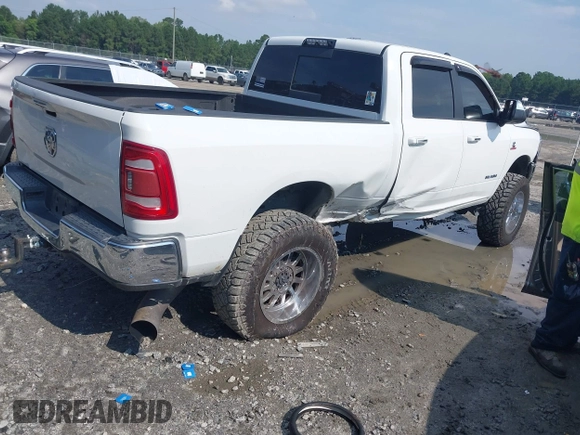 2019 Ram 2500 Lone Star with VIN 3C6UR5DL0KG590912, listed as a IAAI auction lot 42669594 with 128,789 mi miles and . Bid and sale history available at DreamBid. Image 4.