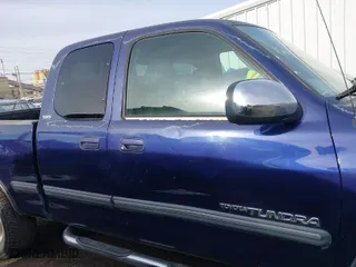 2002 Toyota Tundra SR5 with VIN 5TBRT34132S245421, listed as a IAAI auction lot 41833609 with 373,852 mi miles. Bid and sale history available at carsss.com. Image 13.