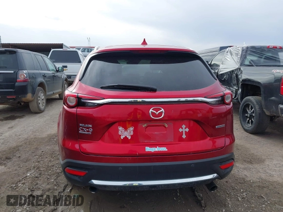 2021 Mazda CX-9 Signature with VIN JM3TCBEY0M0502938, listed as a IAAI auction lot 41734208 with 59,375 mi miles and . Bid and sale history available at carsss.com. Image 16.