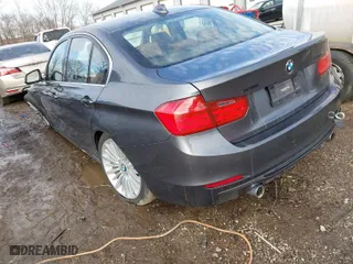 2014 BMW 3 Series 335i xDrive with VIN WBA3B9C53EF588061, listed as a IAAI auction lot 41652035 with 123,345 mi miles. Bid and sale history available at carsss.com. Image 3.
