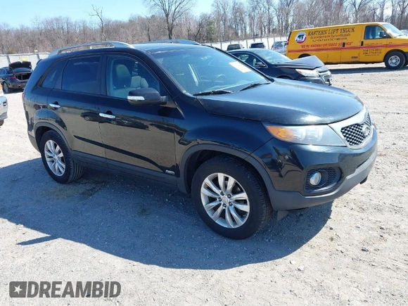 2011 Kia Sorento EX with VIN 5XYKUDA26BG001235, listed as a IAAI auction lot 41754357 with 131,321 mi miles. Bid and sale history available at carsss.com. Image 1.