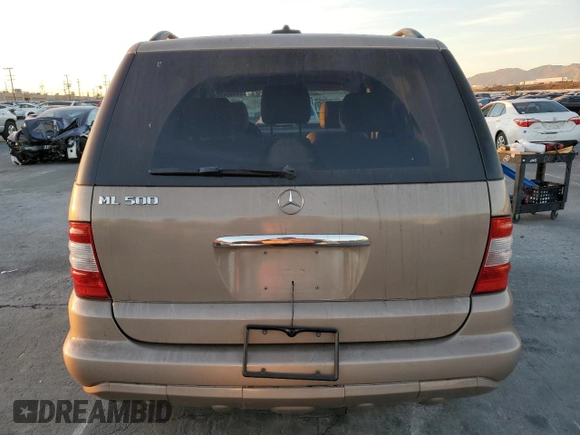 2004 Mercedes-Benz M-Class with VIN 4JGAB75E34A489128, listed as a Copart auction lot 84498404 with 122,094 mi miles and Salvage Title. Bid and sale history available at carsss.com. Image 6.
