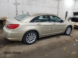 2010 Chrysler Sebring Limited with VIN 1C3CC5FD1AN190847, listed as a Copart auction lot 51219675 with 144,025 mi miles and Salvage title. Bid and sale history available at DreamBid. Image 3.