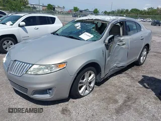 2009 Lincoln MKS с VIN 1LNHM93R59G615147, выставлен на аукционе IAAI как лот 41940056 с пробегом 140 903 миль миль и . История ставок и продаж доступна на DreamBid. Изображение 2.