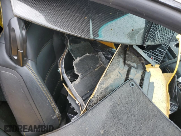 2004 Lamborghini Gallardo z VIN ZHWGU11S34LA01652, wystawiony jako Copart lot #49695214 z przebiegiem Nie podano mil oraz Szkoda całkowita • Salvage title. Historia ofert i sprzedaży dostępna na DreamBid. Obrazek 13.