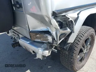 2004 Mercedes-Benz G-Class with VIN WDCYR49E84X142795, listed as a IAAI auction lot 41678941 with 257,855 mi miles. Bid and sale history available at carsss.com. Image 6.