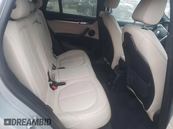 2017 BMW X1 xDrive28i with VIN WBXHT3Z34H4A64917, listed as a Copart auction lot 64486852 with 42,802 mi miles. Bid and sale history available at carsss.com. Image 6.