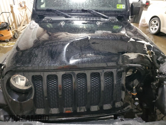 2020 Jeep Wrangler Unlimited Sport S z VIN 1C4HJXDN4LW347458, wystawiony jako Copart lot #52191705 z przebiegiem 37 353 mil mil oraz Szkoda całkowita • Salvage title. Historia ofert i sprzedaży dostępna na DreamBid. Obrazek 13.