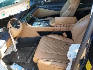 2023 Genesis GV80 with VIN KMUHCESC7PU121865, listed as a Copart auction lot 57990365 with Not provided miles and Salvage title. Bid and sale history available at DreamBid. Image 7.