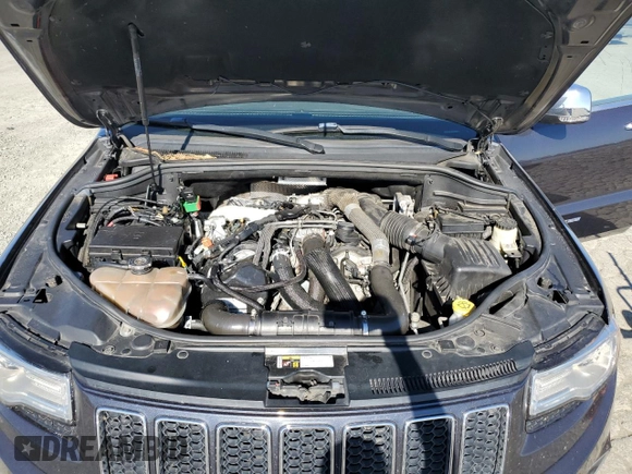 2015 Jeep Grand Cherokee Overland with VIN 1C4RJFCM3FC887817, listed as a Copart auction lot 57420185 with 145,971 mi miles and Clean title. Bid and sale history available at DreamBid. Image 12.