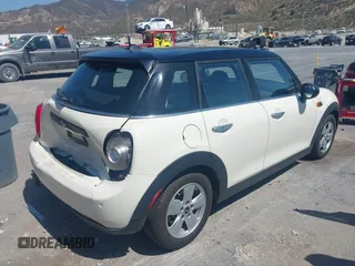 2016 MINI Hardtop 4 Door with VIN WMWXU1C56G2D10605, listed as a IAAI auction lot 42411431 with 35,367 mi miles and . Bid and sale history available at DreamBid. Image 4.