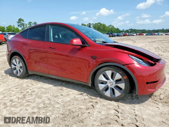 2024 Tesla Model Y Long Range with VIN 7SAYGDEE5RA235910, listed as a Copart auction lot 60988605 with 23,882 mi miles and Salvage title. Bid and sale history available at DreamBid. Image 4.
