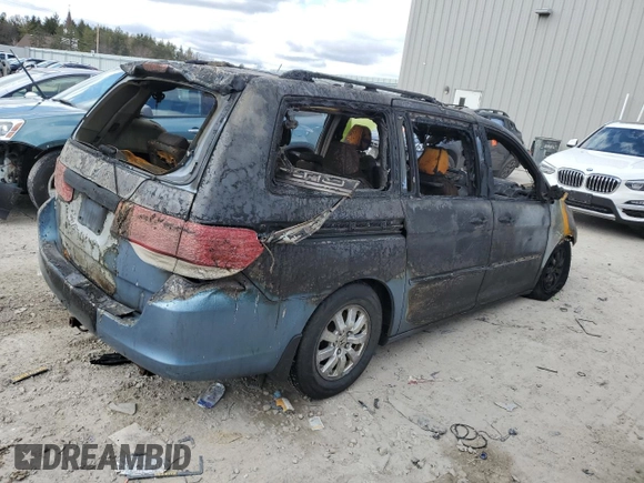 2009 Honda Odyssey EX-L with VIN 5FNRL38699B021100, listed as a Copart auction lot 52871295 with Not Provided miles and Non Repairable. Bid and sale history available at DreamBid. Image 3.