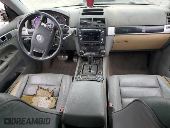 2004 Volkswagen Touareg with VIN WVGCM67L04D027410, listed as a Copart auction lot 79044964 with 100,509 mi miles and Salvage title. Bid and sale history available at DreamBid. Image 8.