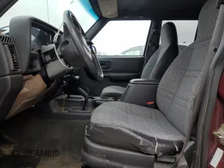 2000 Jeep Cherokee z VIN 1J4FF48S0YL254270, wystawiony jako Copart lot #52589415 z przebiegiem 166 860 mil mil oraz Szkoda całkowita • Salvage title. Historia ofert i sprzedaży dostępna na DreamBid. Obrazek 7.