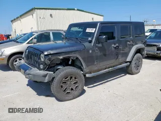 2014 Jeep Wrangler Unlimited Sport with VIN 1C4BJWDG2EL294829, listed as a Copart auction lot 51921685 with 138,203 mi miles and Salvage Title. Bid and sale history available at DreamBid. Image 1.