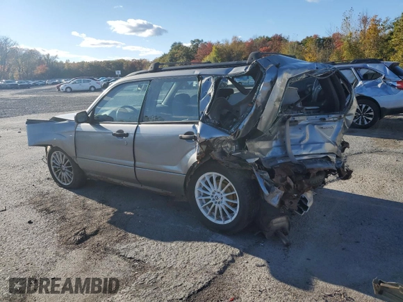 2007 Subaru Forester X with VIN JF1SG63677H719237, listed as a Copart auction lot 75498084 with 214,815 mi miles and Salvage Title. Bid and sale history available at carsss.com. Image 2.