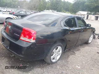2010 Dodge Charger with VIN 2B3CK4CV0AH238001, listed as a IAAI auction lot 42449286 with 245,934 mi miles and . Bid and sale history available at DreamBid. Image 4.