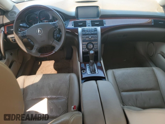 2010 Acura RL Technology with VIN JH4KB2F60AC000928, listed as a Copart auction lot 62216225 with 222,876 mi miles and Salvage title. Bid and sale history available at DreamBid. Image 8.