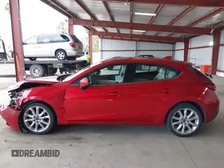 2014 Mazda 3 S Grand Touring with VIN JM1BM1M38E1200696, listed as a IAAI auction lot 41906426 with 50,048 mi miles and . Bid and sale history available at DreamBid. Image 14.