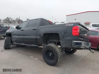 2015 Chevrolet Silverado 1500 LT with VIN 3GCUKREC0FG302637, listed as a IAAI auction lot 40456723 with 145,079 mi miles. Bid and sale history available at carsss.com. Image 3.