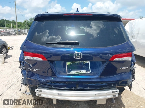 2022 Honda Pilot Touring 7-Passenger with VIN 5FNYF5H61NB019768, listed as a IAAI auction lot 42438780 with Not provided miles and . Bid and sale history available at DreamBid. Image 17.