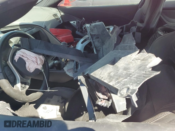 2015 Chevrolet Corvette 1LT z VIN 1G1YA2D73F5118809, wystawiony jako Copart lot #52425605 z przebiegiem Nie podano mil oraz Szkoda całkowita • Salvage title. Historia ofert i sprzedaży dostępna na DreamBid. Obrazek 7.