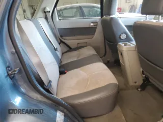 2010 Mercury Mariner Premier z VIN 4M2CN8HG3AKJ29557, wystawiony jako Copart lot #53318115 z przebiegiem 141 895 mil mil oraz Szkoda całkowita • Salvage title. Historia ofert i sprzedaży dostępna na DreamBid. Obrazek 11.