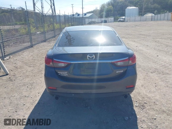 2016 Mazda 6 i Sport with VIN JM1GJ1U54G1413244, listed as a IAAI auction lot 42062416 with 148,970 mi miles and . Bid and sale history available at DreamBid. Image 16.