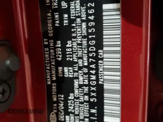 2013 Kia Optima LX z VIN 5XXGM4A75DG159462, wystawiony jako Copart lot #56678015 z przebiegiem 133 434 mil mil oraz Szkoda całkowita • Salvage title. Historia ofert i sprzedaży dostępna na DreamBid. Obrazek 12.