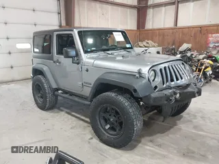 2014 Jeep Wrangler Sport with VIN 1C4AJWAG0EL173362, listed as a IAAI auction lot 42231863 with 99,321 mi miles and . Bid and sale history available at DreamBid. Image 1.