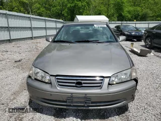 2000 Toyota Camry CE z VIN 4T1BG22K5YU013891, wystawiony jako Copart lot #56693255 z przebiegiem 248 922 mil mil oraz Szkoda całkowita • Salvage title. Historia ofert i sprzedaży dostępna na DreamBid. Obrazek 5.